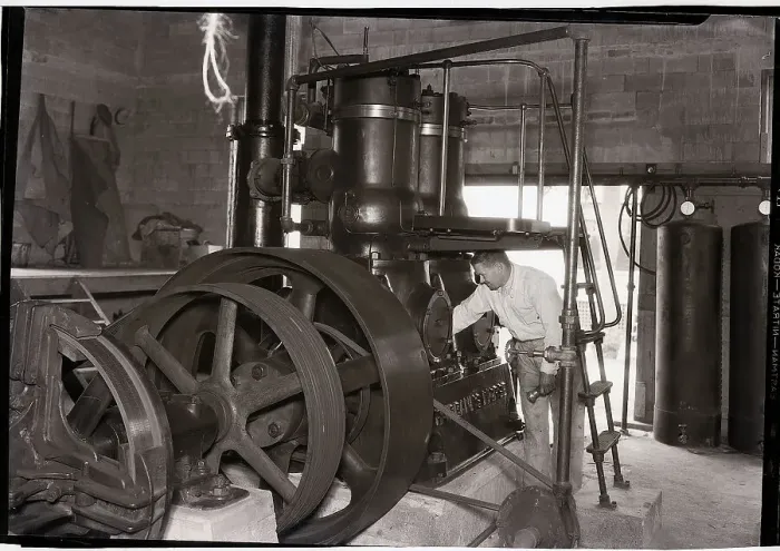 Framed Print : Worker Operating Diesel Engine