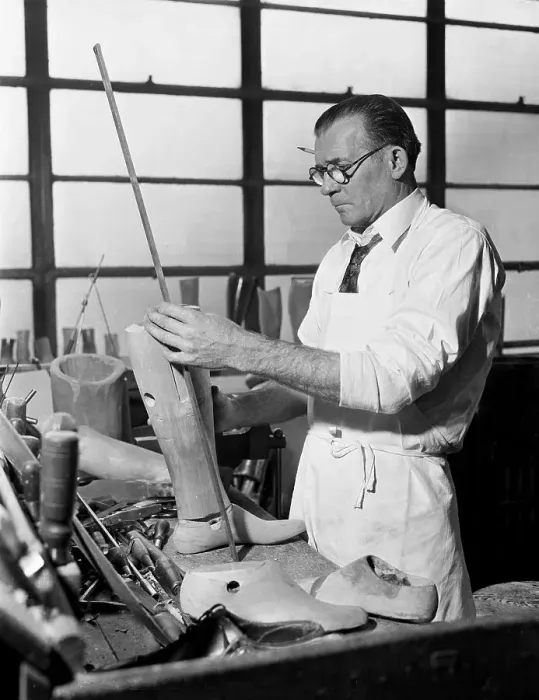 Framed Print : Worker Preparing Artificial Limb Framed Print : Worker Preparing Artificial Limb