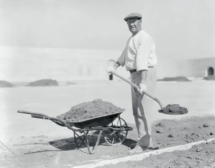 Framed Print : Worker Shoveling Dirt Framed Print : Worker Shoveling Dirt