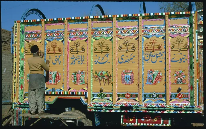 Framed Print : Worker Writing On Truck Framed Print : Worker Writing On Truck