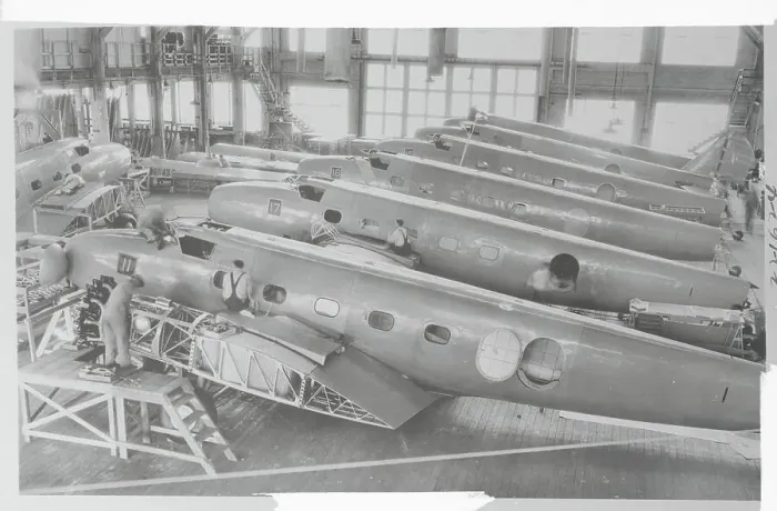 Framed Print : Workers and Airplanes in Interior of Boeing Plant