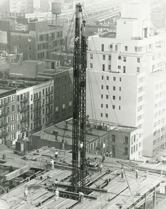 Framed Print : Workers on building site on urban setting, (B&W), elevated view Framed Print : Workers on building site on urban setting, (B&W), elevated view