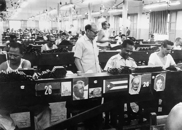 Framed Print : Workers in Cigar Factory with Posters Framed Print : Workers in Cigar Factory with Posters