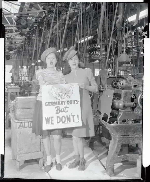 Framed Print : Workers Holding Sign in Plant