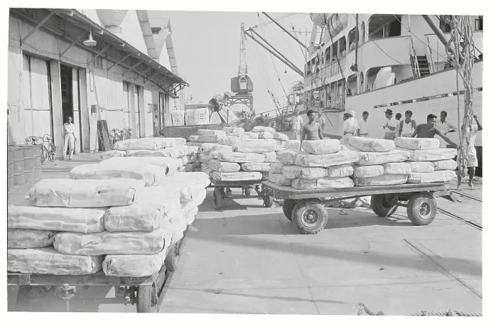 Framed Print : Workers Loading Rubber for Export on Ship Dock Framed Print : Workers Loading Rubber for Export on Ship Dock