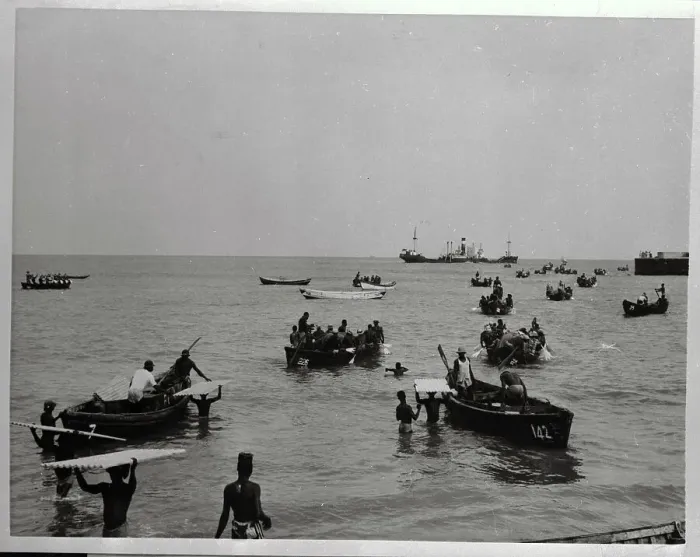 Framed Print : Workers Men Unloading Small Boats Framed Print : Workers Men Unloading Small Boats