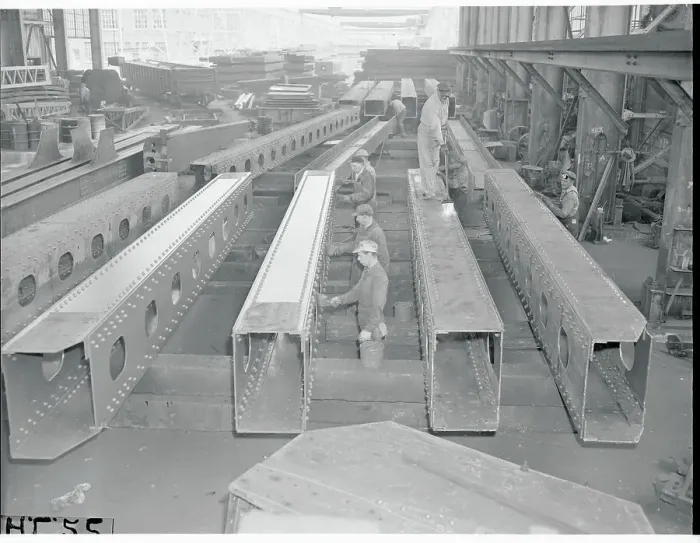 Framed Print : Workers Preparing Bridge Parts for Shipment