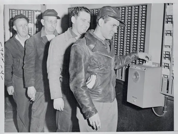 Framed Print : Workers Punching in at the Time Clock
