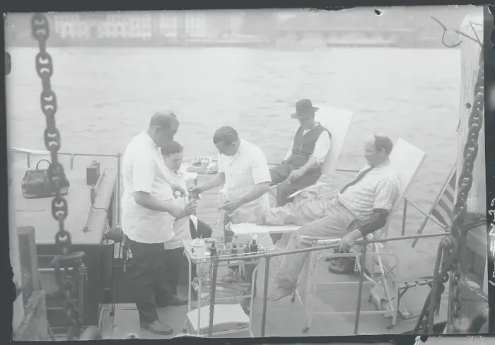 Framed Print : Workers Receiving Foot Treatment on Boat Framed Print : Workers Receiving Foot Treatment on Boat