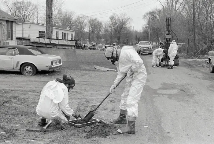 Framed Print : Workers Sifting Soil for Toxins Framed Print : Workers Sifting Soil for Toxins