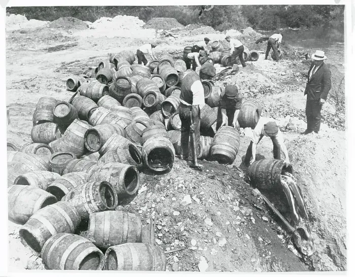 Framed Print : Workers Spilling Seized Beer Framed Print : Workers Spilling Seized Beer