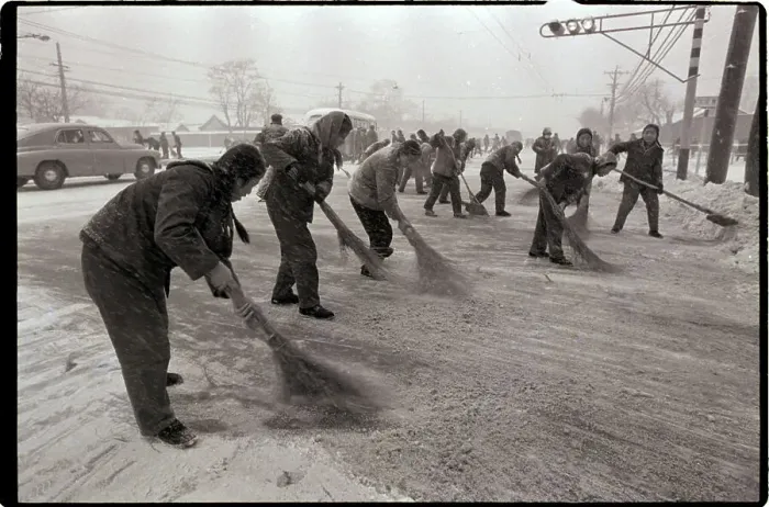 Framed Print : Workers Sweeping Snow Off Roads