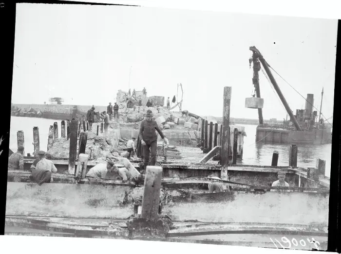 Framed Print : Workers Tearing down Heligoland Harbor Site
