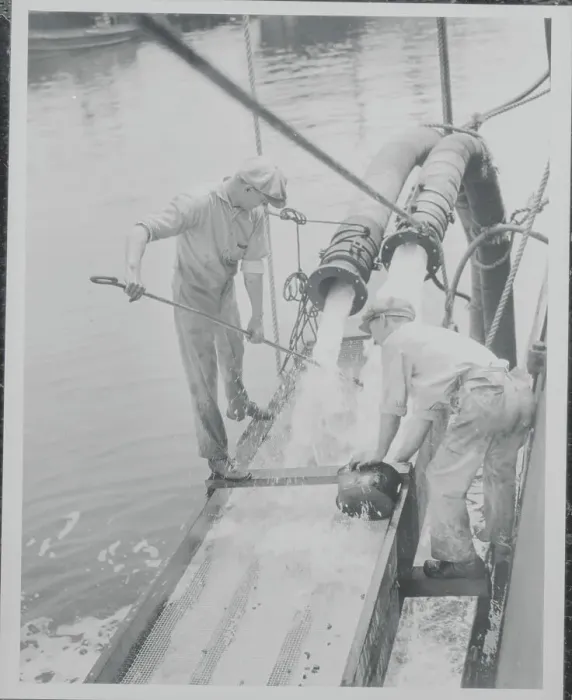Framed Print : Workers Using Gold Digging Machinery on Waters Edge Framed Print : Workers Using Gold Digging Machinery on Waters Edge