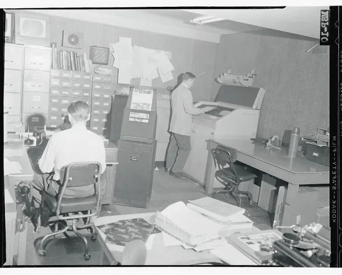 Framed Print : Workers Using the United Press Unifax Machine Framed Print : Workers Using the United Press Unifax Machine