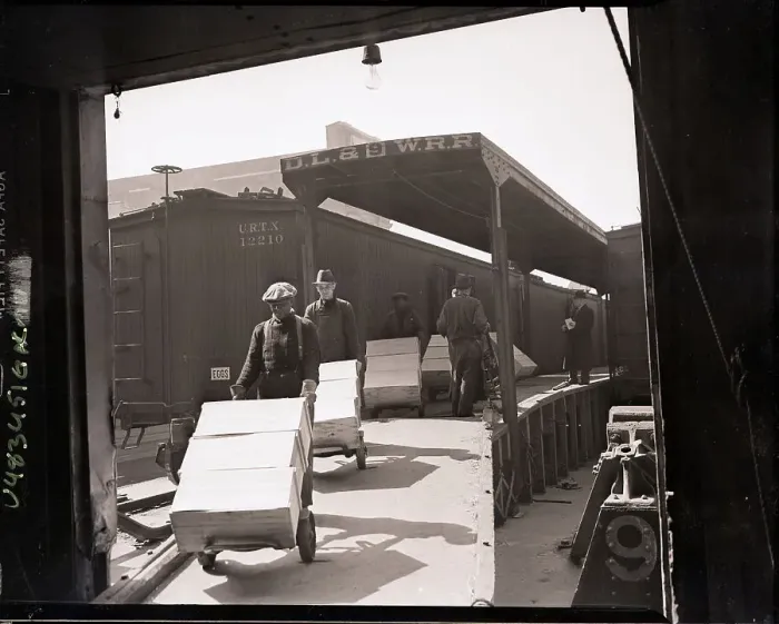 Framed Print : Workers Wheel Crates Off Loading Dock Framed Print : Workers Wheel Crates Off Loading Dock