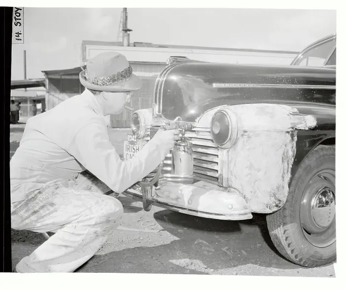 Framed Print : Workman Spraying Auto with Black Paint Framed Print : Workman Spraying Auto with Black Paint