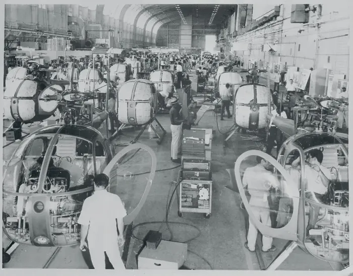 Framed Print : Workmen Assembling Helicopters Framed Print : Workmen Assembling Helicopters