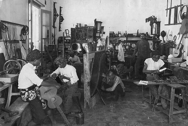 Workshop. circa 1910: The workshop of instrument makers J H Seelig and Sons in India