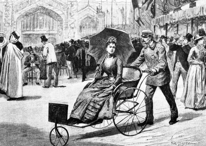 Framed Print : World exhibition Paris 1889 - Champ de Mars, man pushing a woman in a wheelchair taxi Framed Print : World exhibition Paris 1889 - Champ de Mars, man pushing a woman in a wheelchair taxi