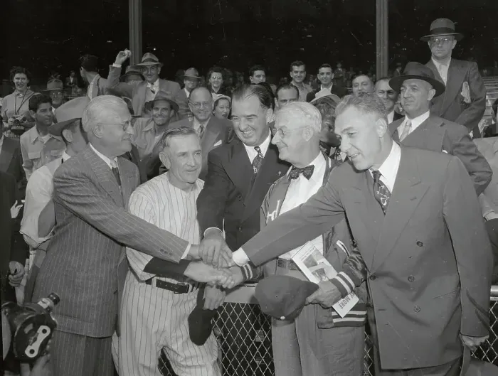 Framed Print : World Series Promoters Joining Hands