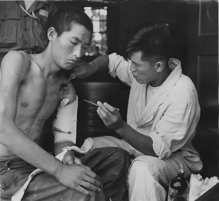 Framed Print : Wounded Korean POW Framed Print : Wounded Korean POW