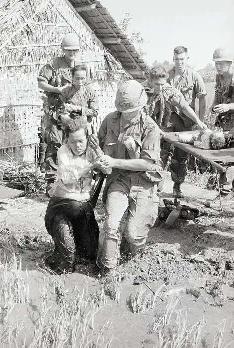Framed Print : Wounded Vietnamese Evacuated by Soldier Framed Print : Wounded Vietnamese Evacuated by Soldier