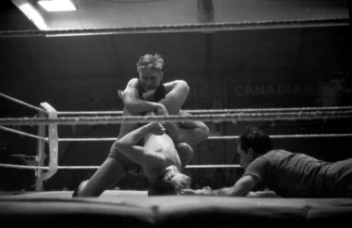 Framed Print : Wrestlers & Refugee Framed Print : Wrestlers & Refugee
