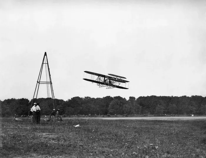 Framed Print : Wright Bros Airplane Flying Past Men Framed Print : Wright Bros Airplane Flying Past Men