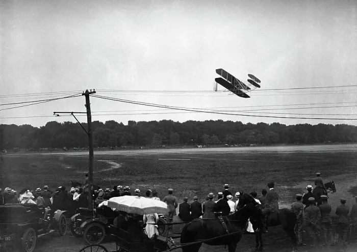 Framed Print : Wright Brothers Plane Above Power Lines