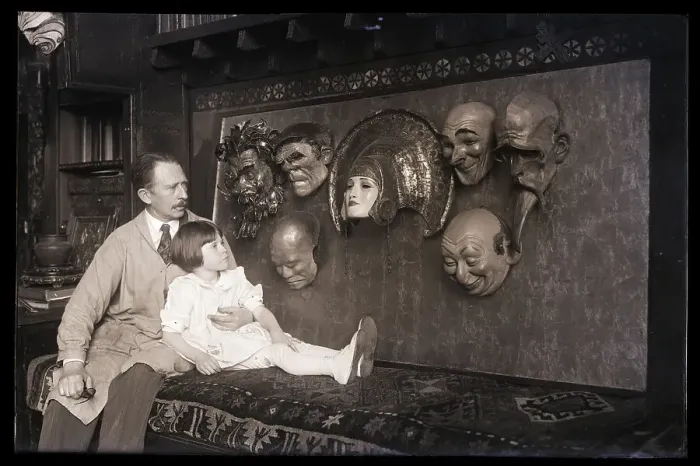 Framed Print : W.T. Benda with Daughter in Lap Looking at Masks Framed Print : W.T. Benda with Daughter in Lap Looking at Masks