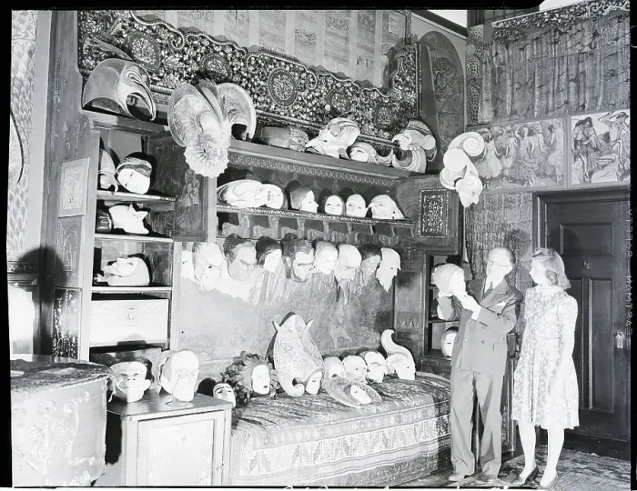 Framed Print : W.T. Benda and Daughter Among His Masks Framed Print : W.T. Benda and Daughter Among His Masks