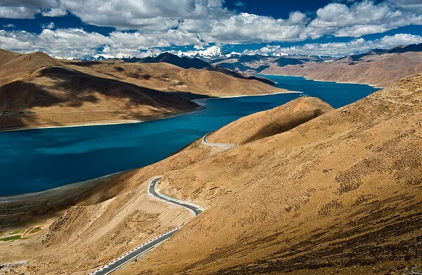 Yamdrok lake with road and sky