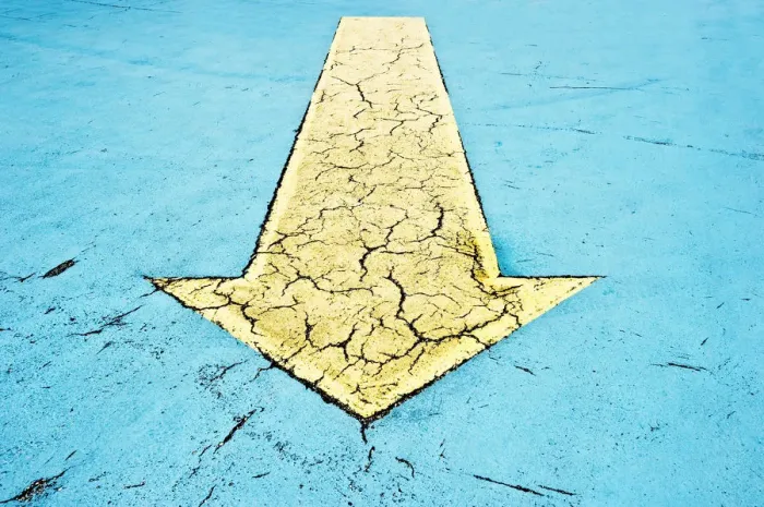 Framed Print : Yellow arrow on blue asphalt Framed Print : Yellow arrow on blue asphalt