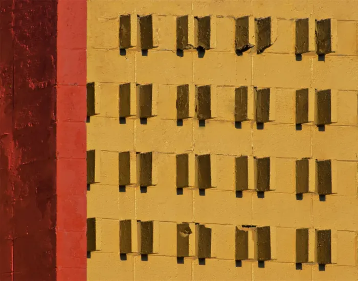 Framed Print : Yellow Studded Wall Framed Print : Yellow Studded Wall