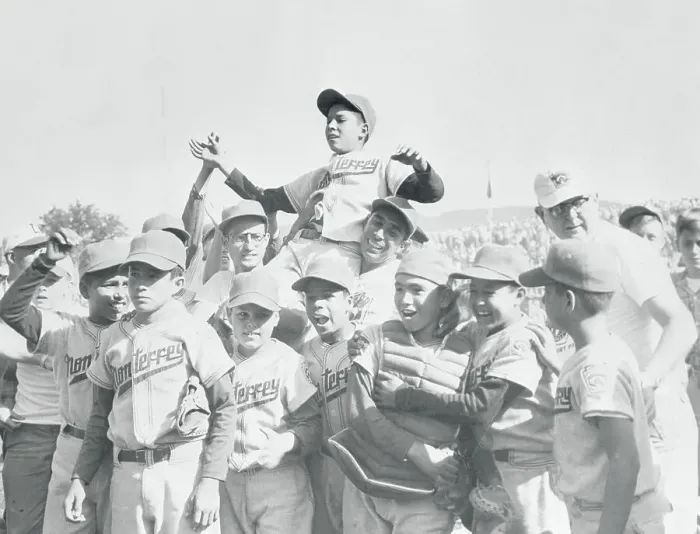 Framed Print : Young Angel Macias Being Carried by His Teammates Framed Print : Young Angel Macias Being Carried by His Teammates