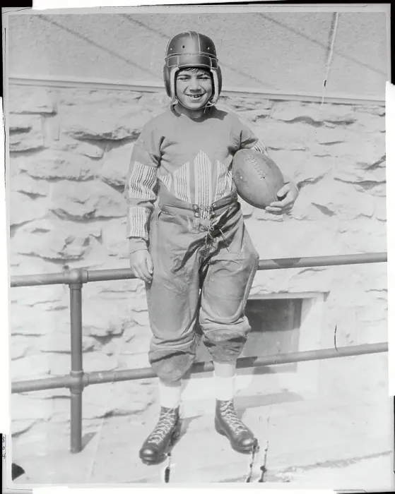 Framed Print : Young Billy Rockne Posing in Football Uniform
