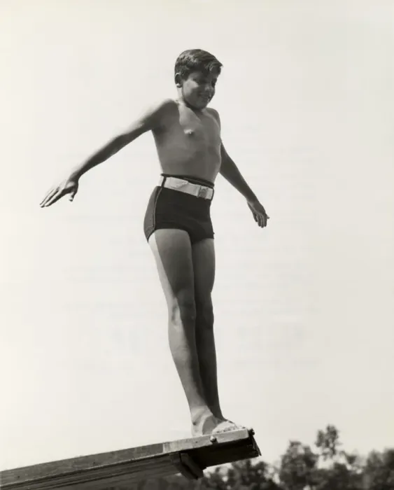 Framed Print : Young boy at end of diving board Framed Print : Young boy at end of diving board