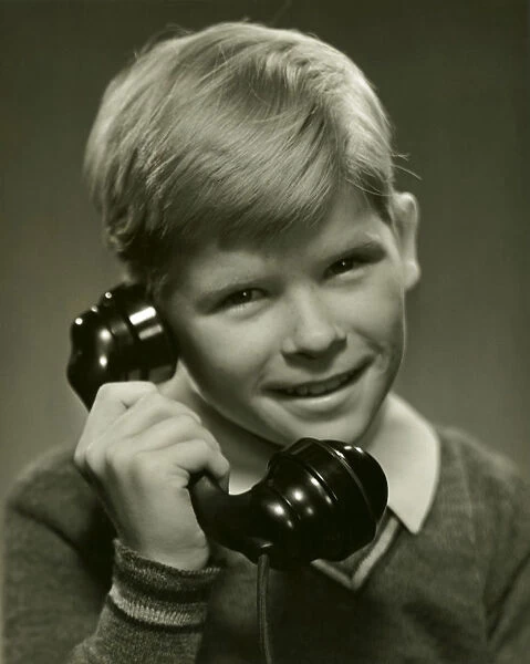 Young boy on telephone