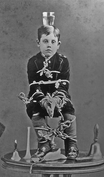 A Young Boy Tied Up