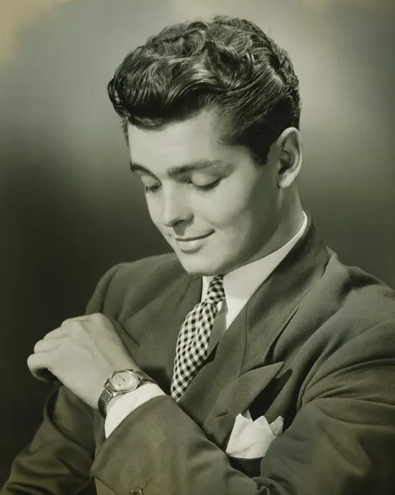 Framed Print : Young businessman checking time on watch, (B&W), close-up Framed Print : Young businessman checking time on watch, (B&W), close-up