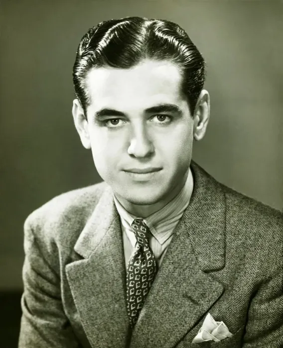 Framed Print : Young businessman posing in studio, (B&W), portrait Framed Print : Young businessman posing in studio, (B&W), portrait