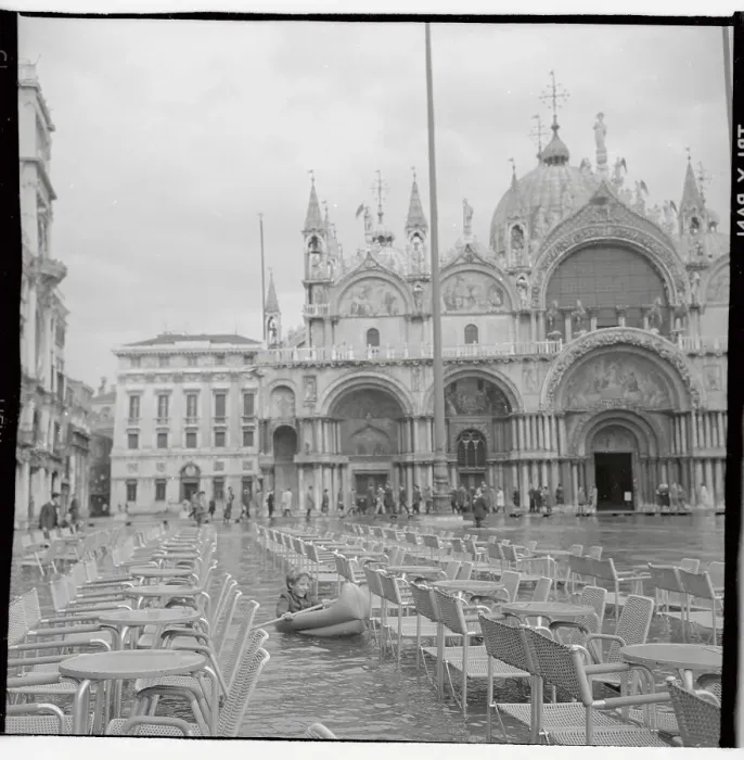 Framed Print : Young Child Paddling Boat Through Venice Framed Print : Young Child Paddling Boat Through Venice
