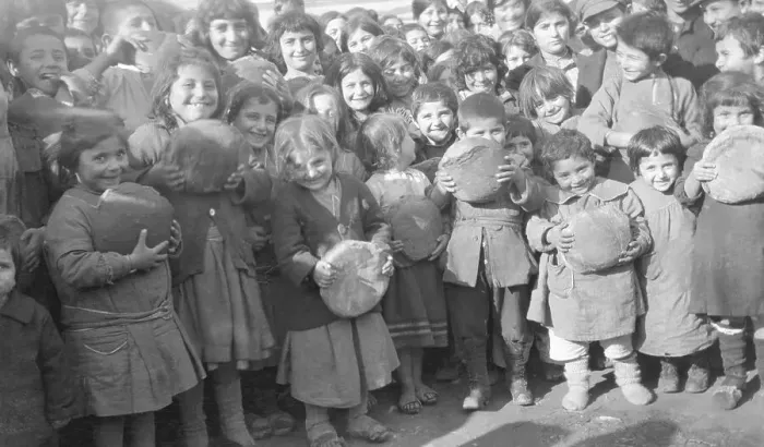 Framed Print : Young Children Holding Loaves of Bread Framed Print : Young Children Holding Loaves of Bread
