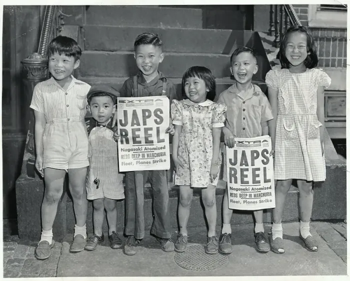 Framed Print : Young Chinese Children Holding Newspapers Framed Print : Young Chinese Children Holding Newspapers