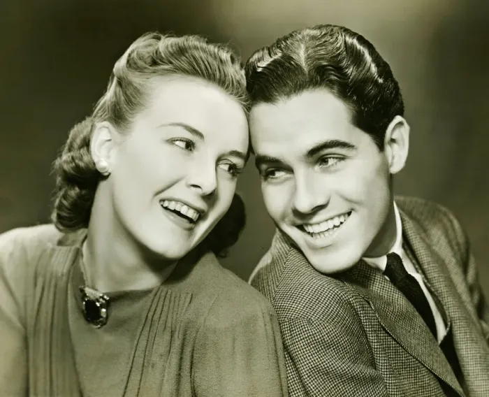 Framed Print : Young couple with head to head, smiling, (B&W) Framed Print : Young couple with head to head, smiling, (B&W)