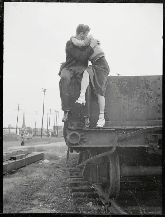 Framed Print : Young Couple Kissing on Railroad Car Framed Print : Young Couple Kissing on Railroad Car