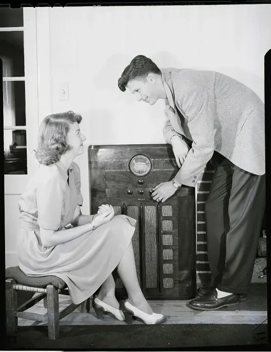 Framed Print : Young Couple at the Radio Framed Print : Young Couple at the Radio