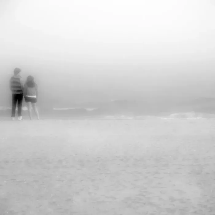 Framed Print : young couple standing ashore of Coney Island beach Framed Print : young couple standing ashore of Coney Island beach