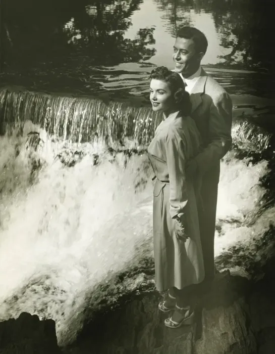 Framed Print : Young couple standing by waterfall, (B&W) Framed Print : Young couple standing by waterfall, (B&W)